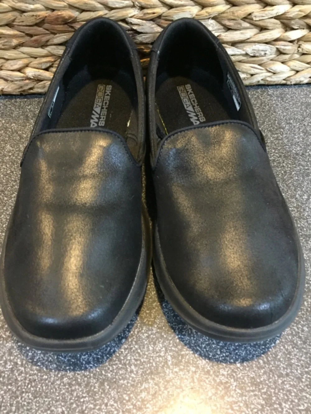 Skechers black slip